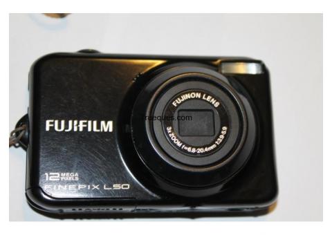 Camara digital fujifilm finepixl 50 por guitarra electrica