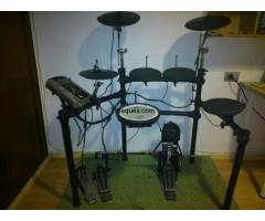 Batería electrónica roland td9-k por bicicleta de montaña doble.