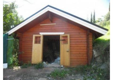 Cabaña de madera de 8 x 5 m.