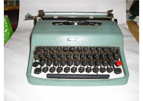 Olivetti lettera 32 y pluma 22