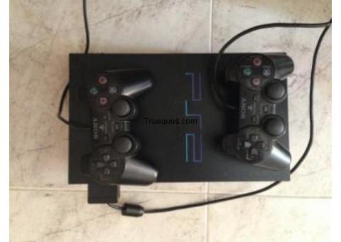 Play station 2 con dos mandos y varios juegos