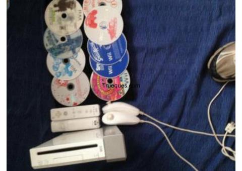 Wii con 2 controles con 9 juegos inclullendo super smash y mario carr y call of duty 2controles