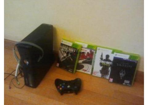 Xbox 360 slim + juegos + auriculares